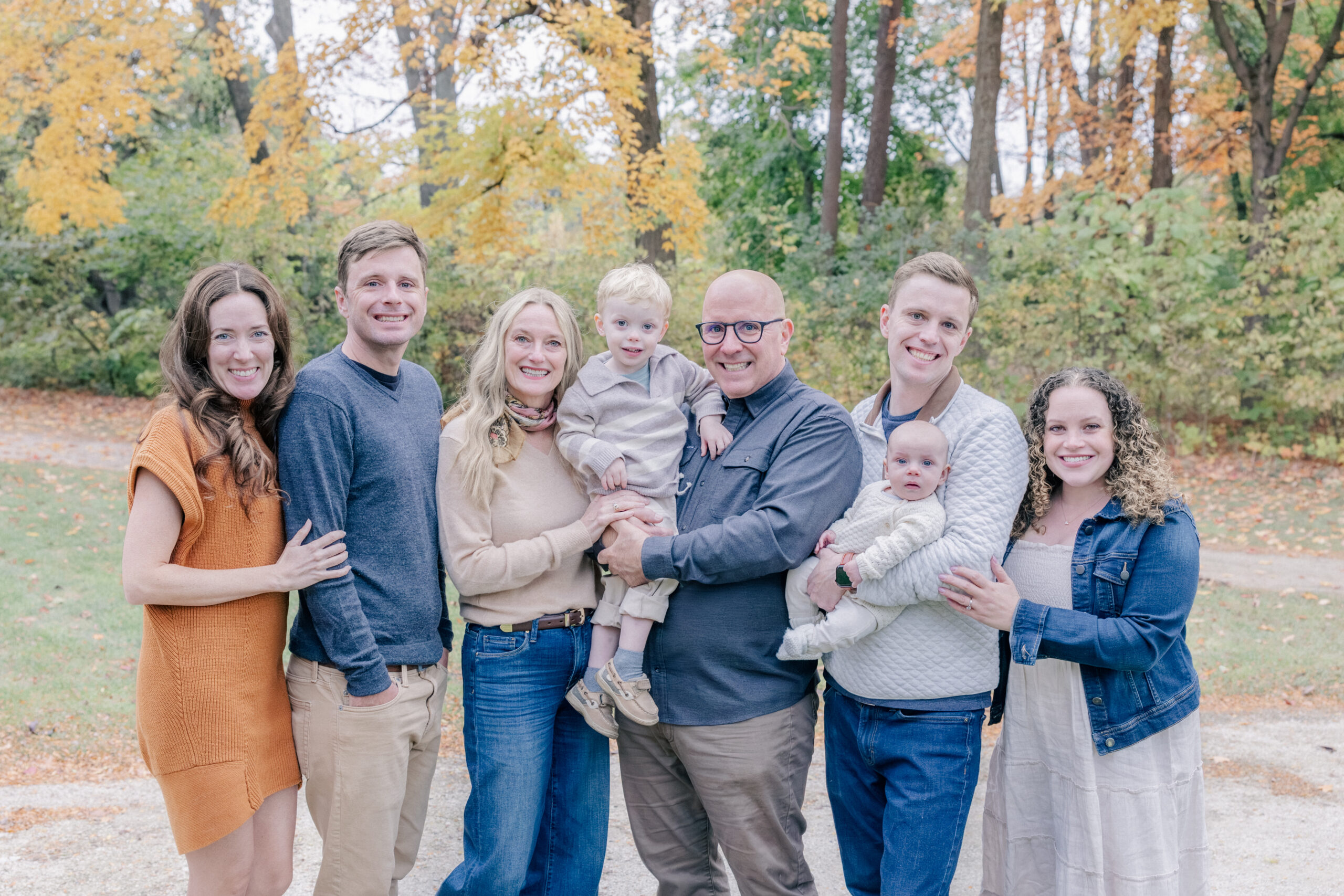 Family laughing together during a candid photo session in the Chicago suburbs
